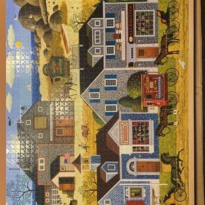 Buffalo Games 2000 piece puzzle. Charles Wysocki “Devilstone Harbor.”